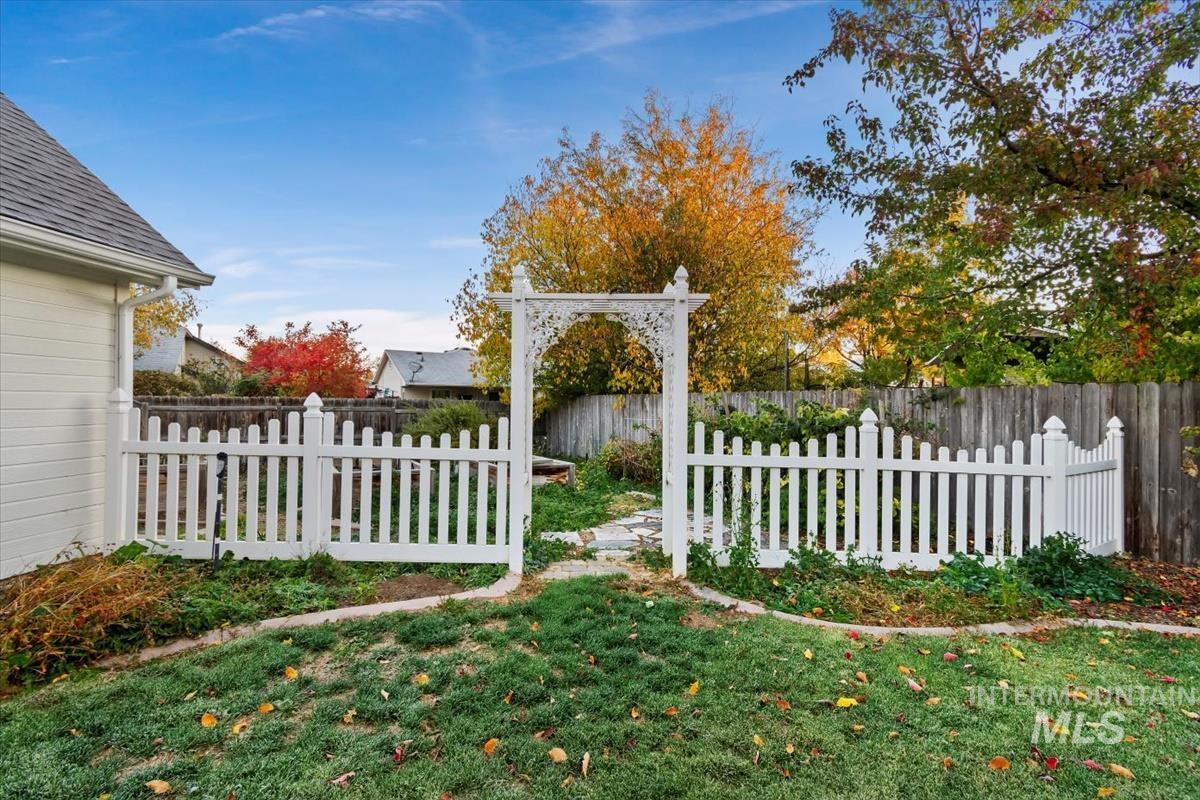 View of fenced backyard