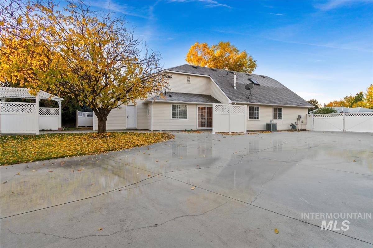Back of house with a gate