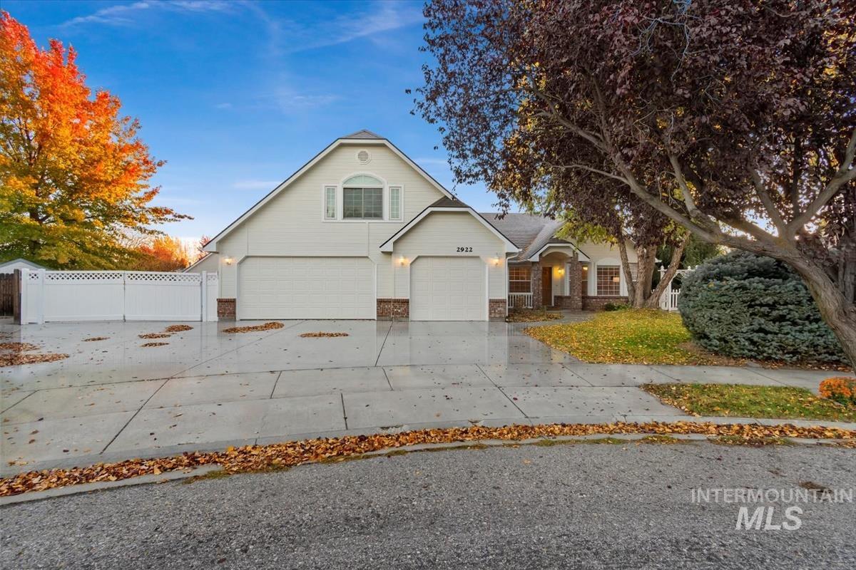 Traditional-style home featuring concrete driveway
