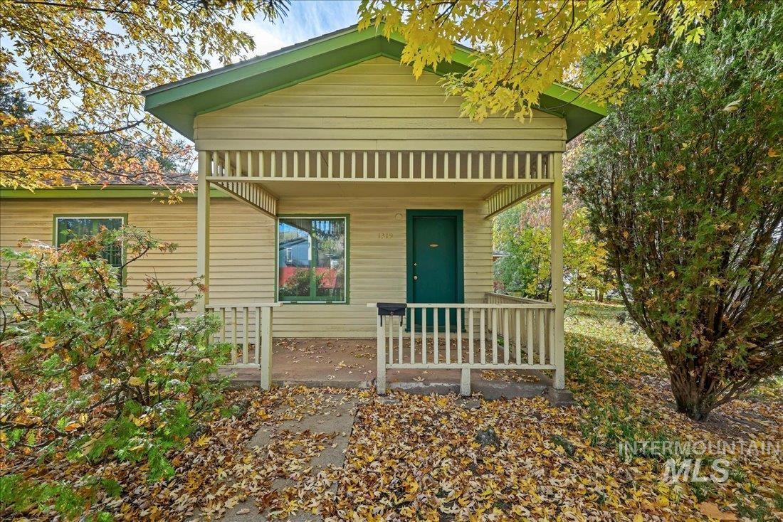 View of front of property featuring covered porch