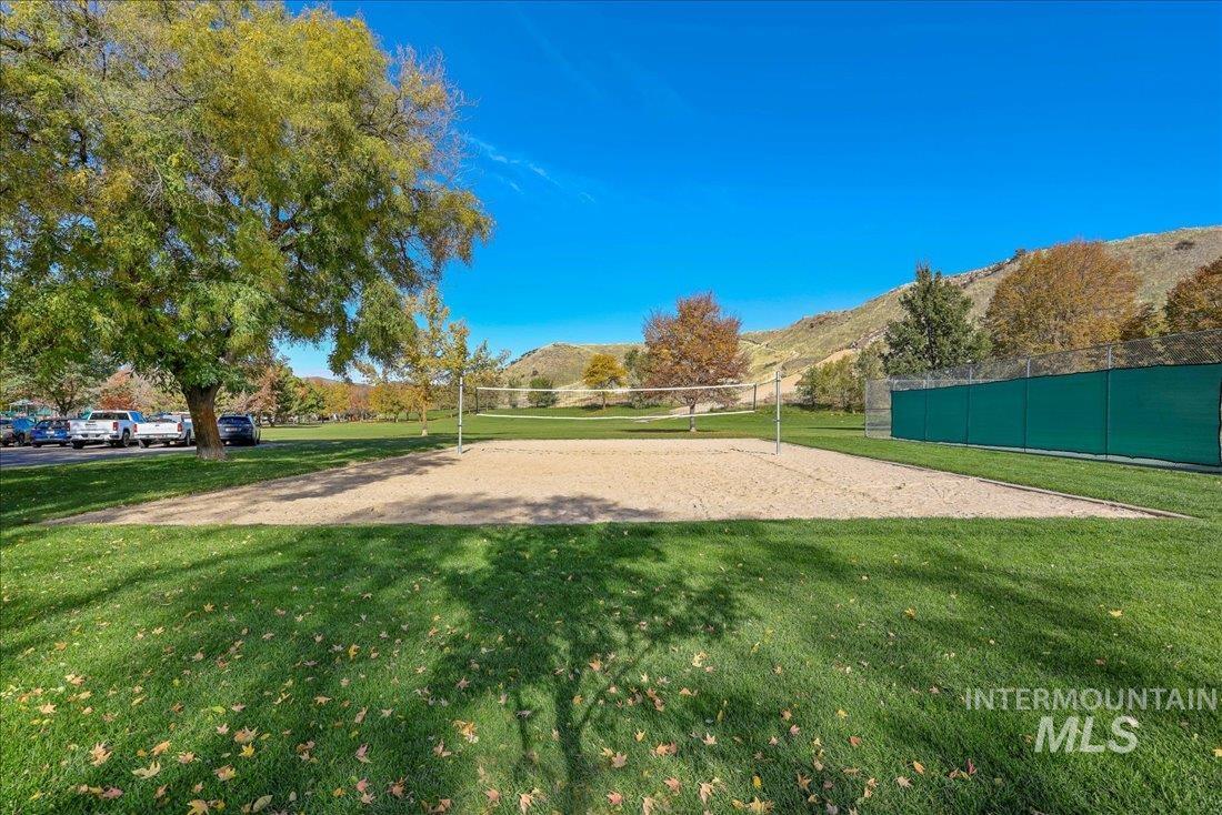 View of community featuring volleyball court and a mountain view