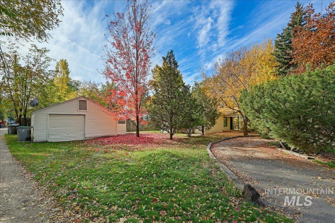 View of green lawn with an outdoor structure