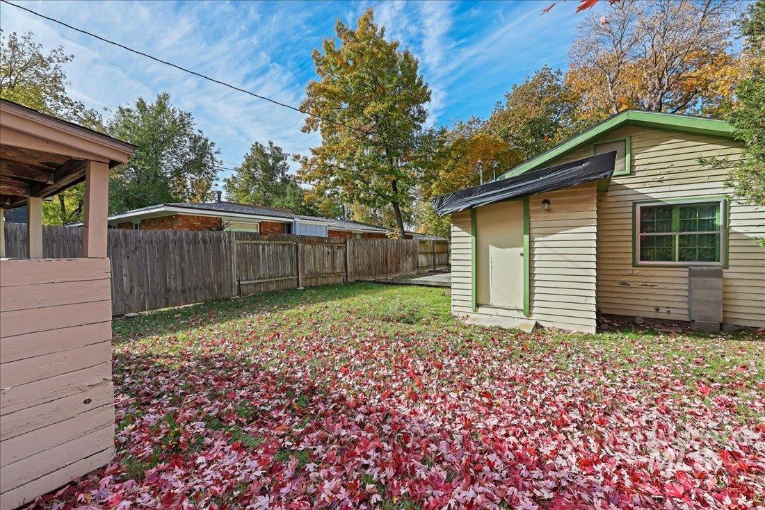 View of fenced backyard
