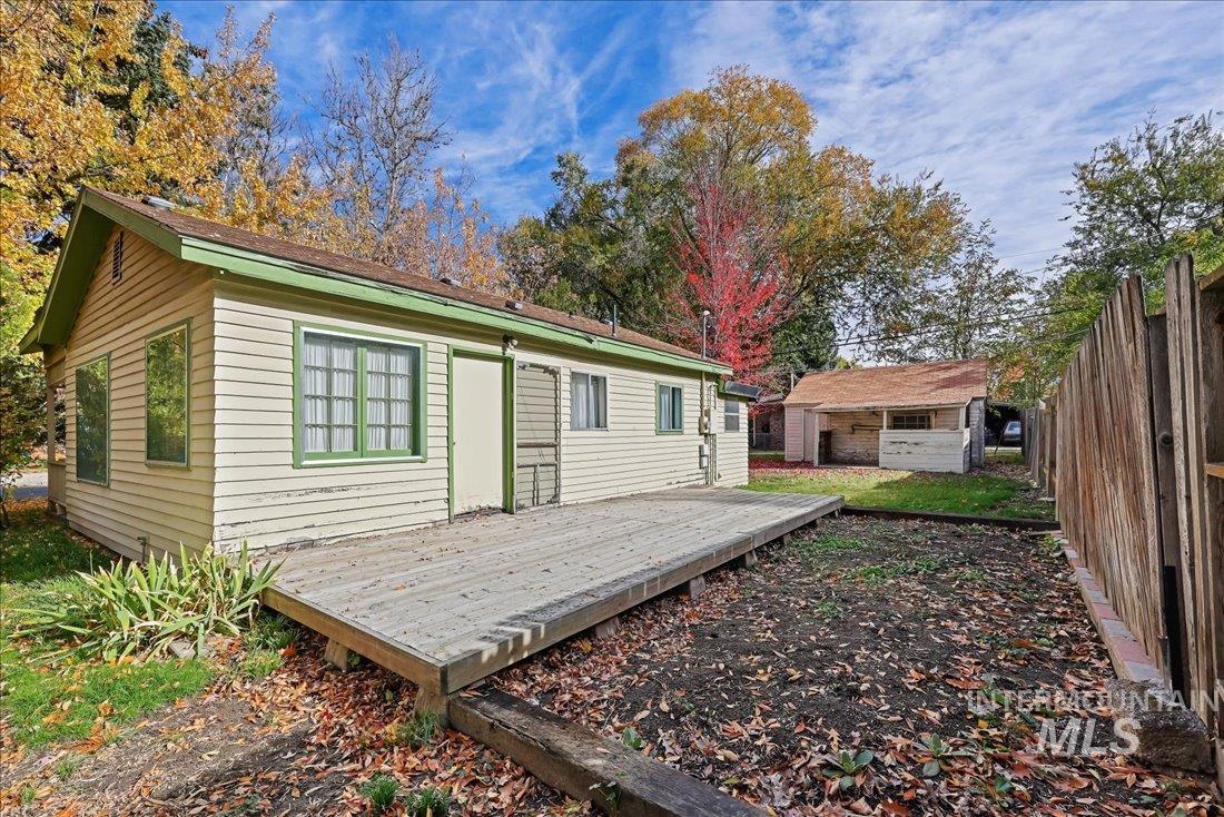 Back of house featuring a deck