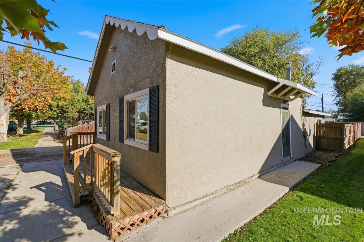 View of side of property with stucco siding