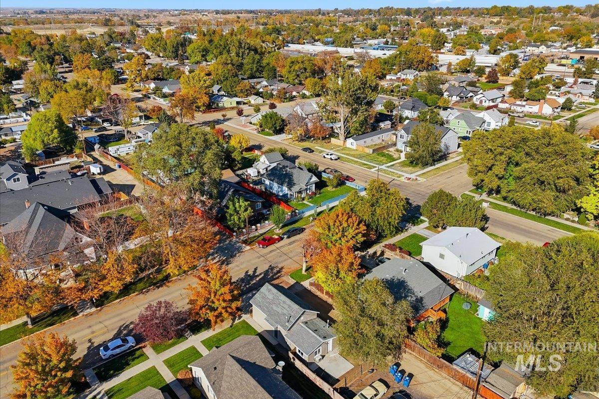 Aerial overview of property's location with nearby suburban area