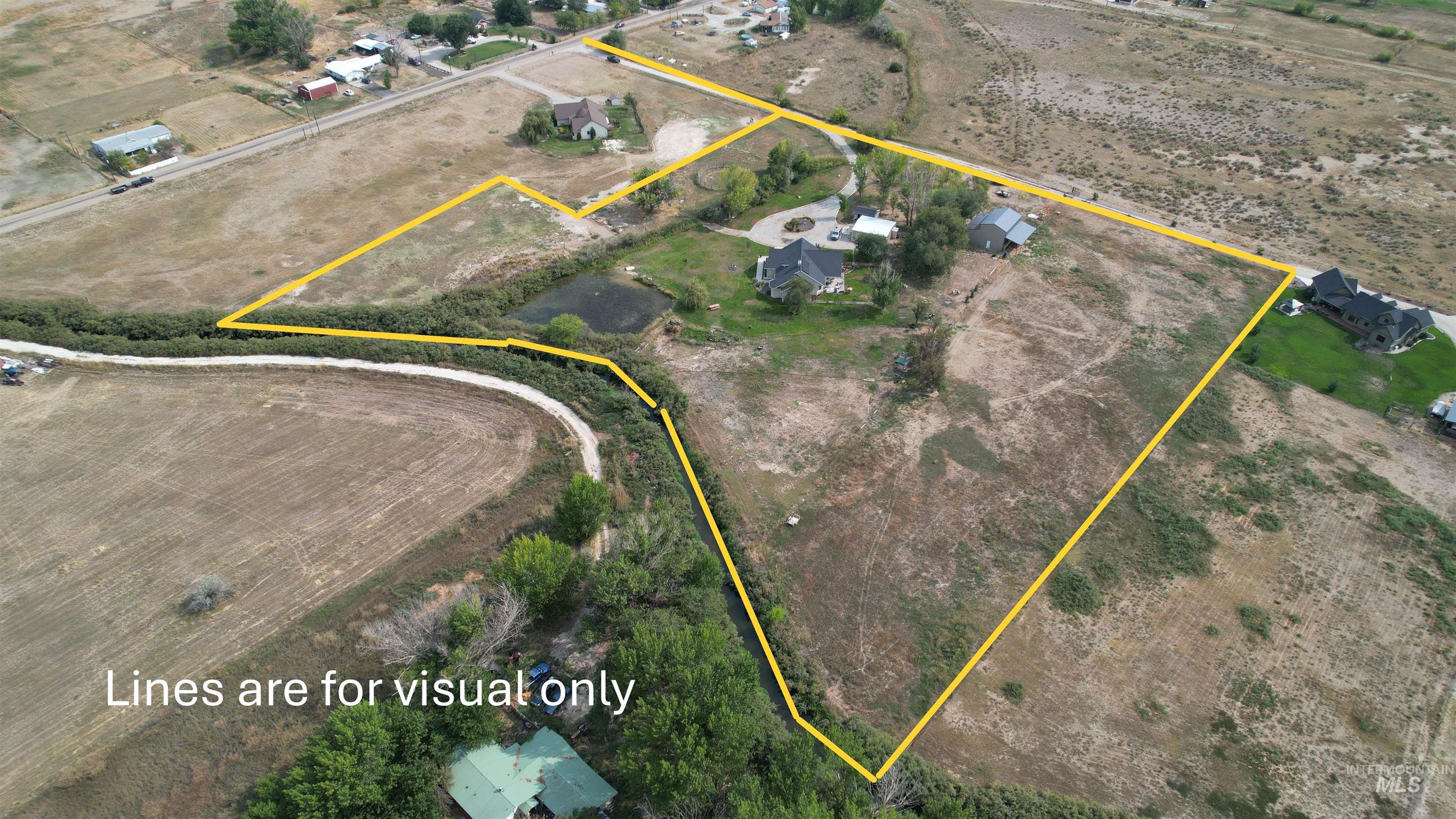 Overview of rural landscape featuring property parcel outlined
