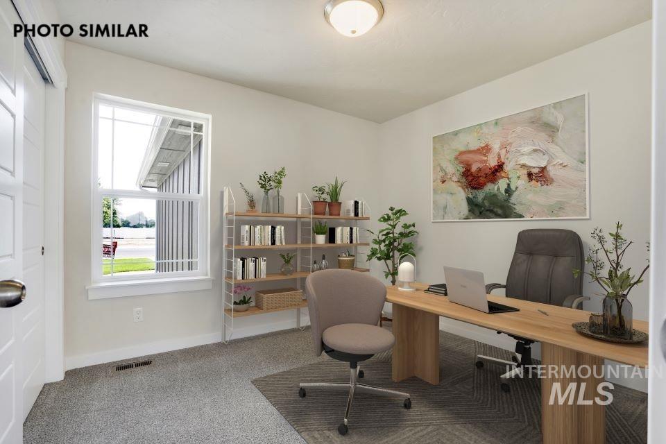 Office featuring carpet floors and baseboards