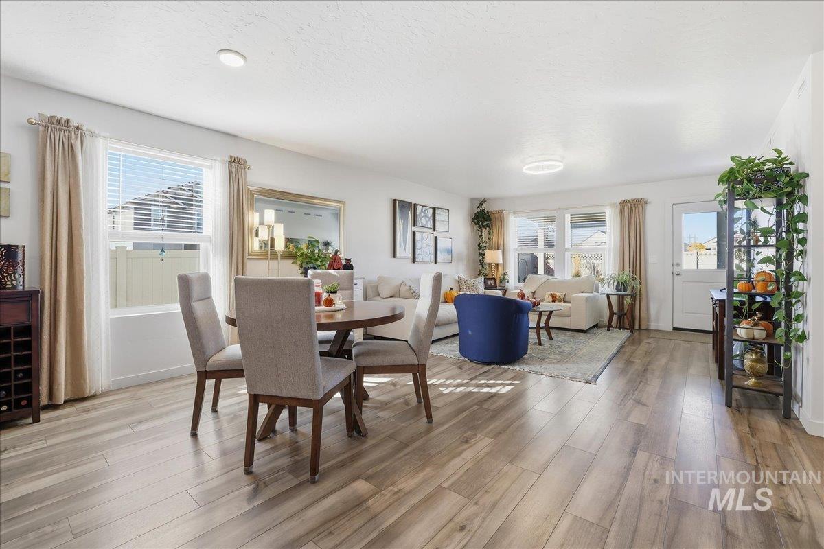 Dining space featuring light wood-style floors
