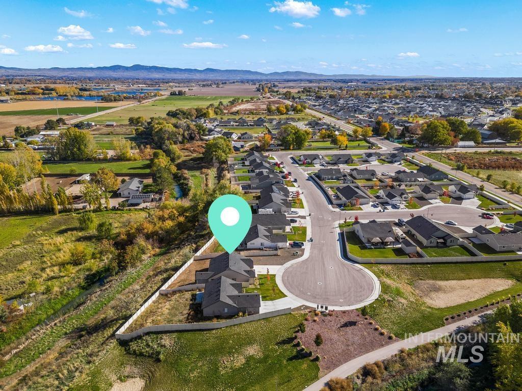 Aerial view of residential area with mountains