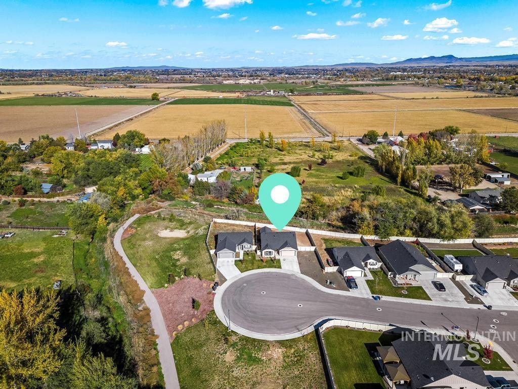 Aerial overview of property's location featuring mountains and rural landscape