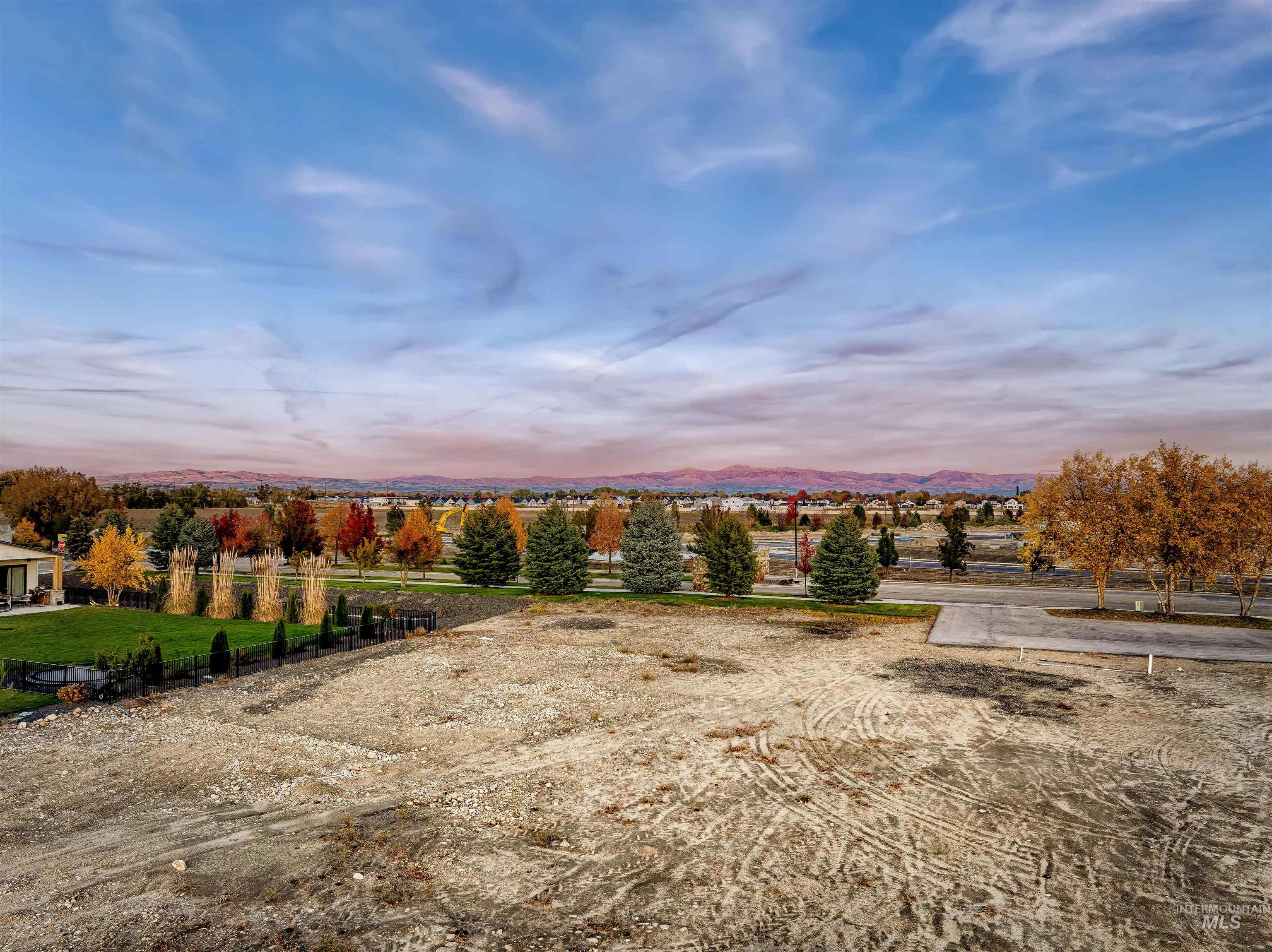 View of mountain background featuring rural landscape