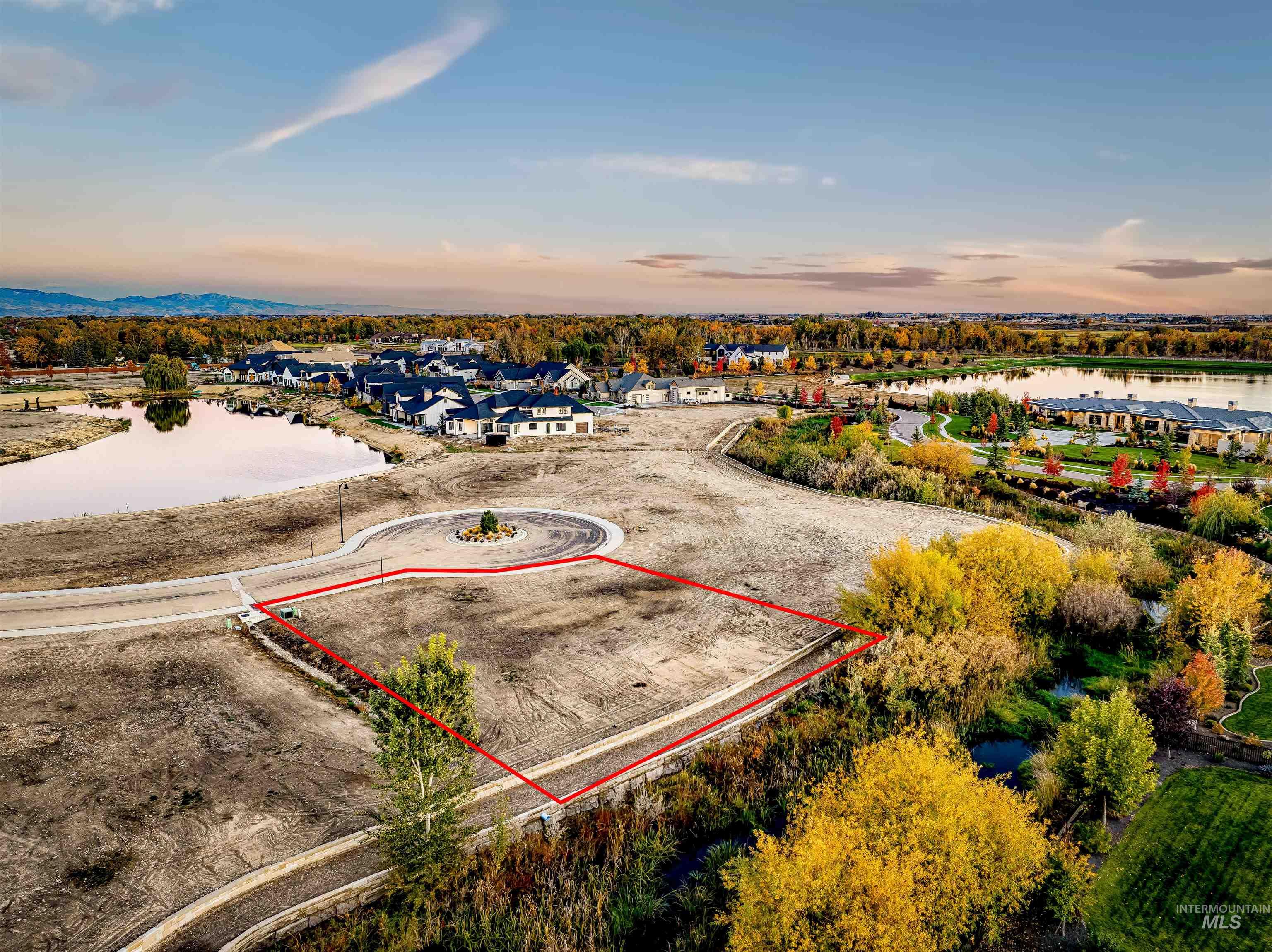 Aerial view of residential area with property boundaries highlighted