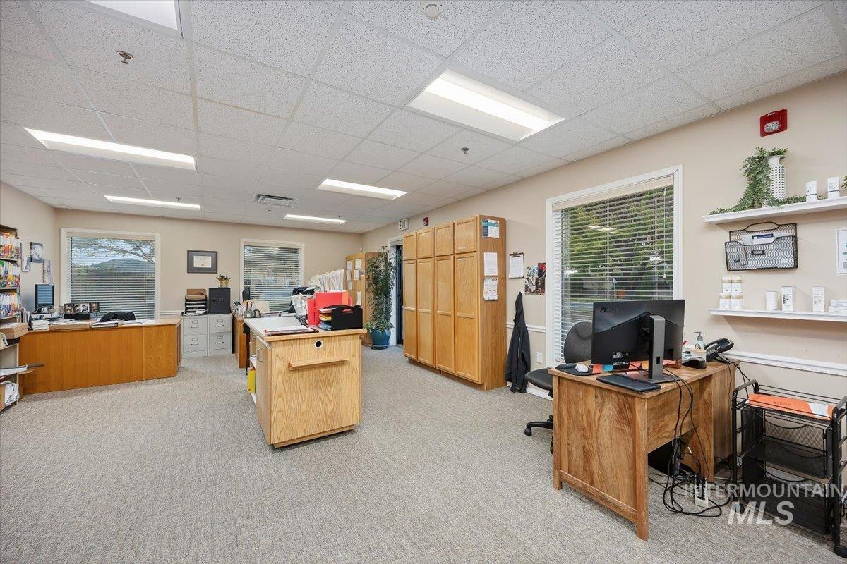 Home office with a paneled ceiling
