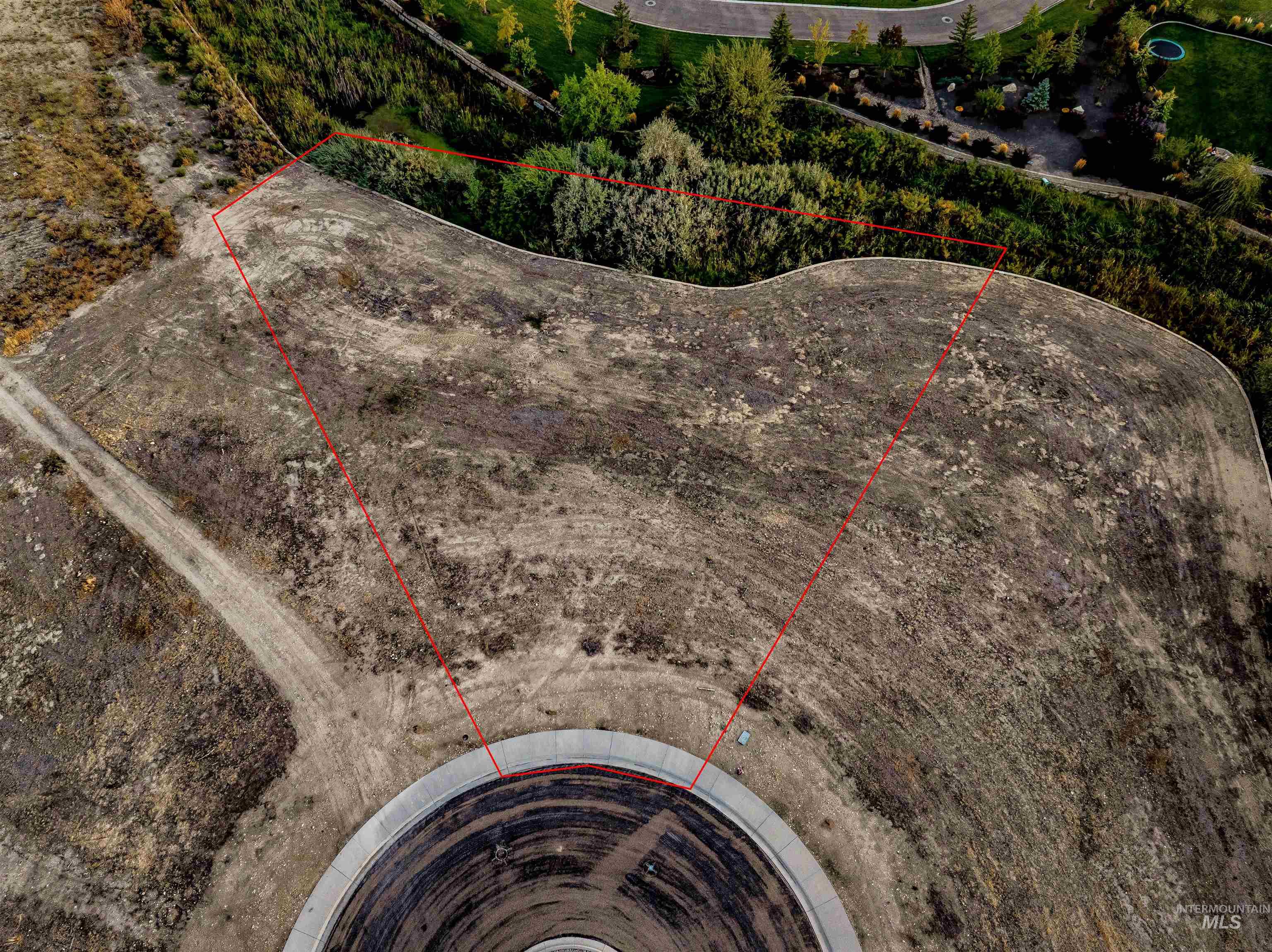 Aerial view of property's location featuring property parcel outlined