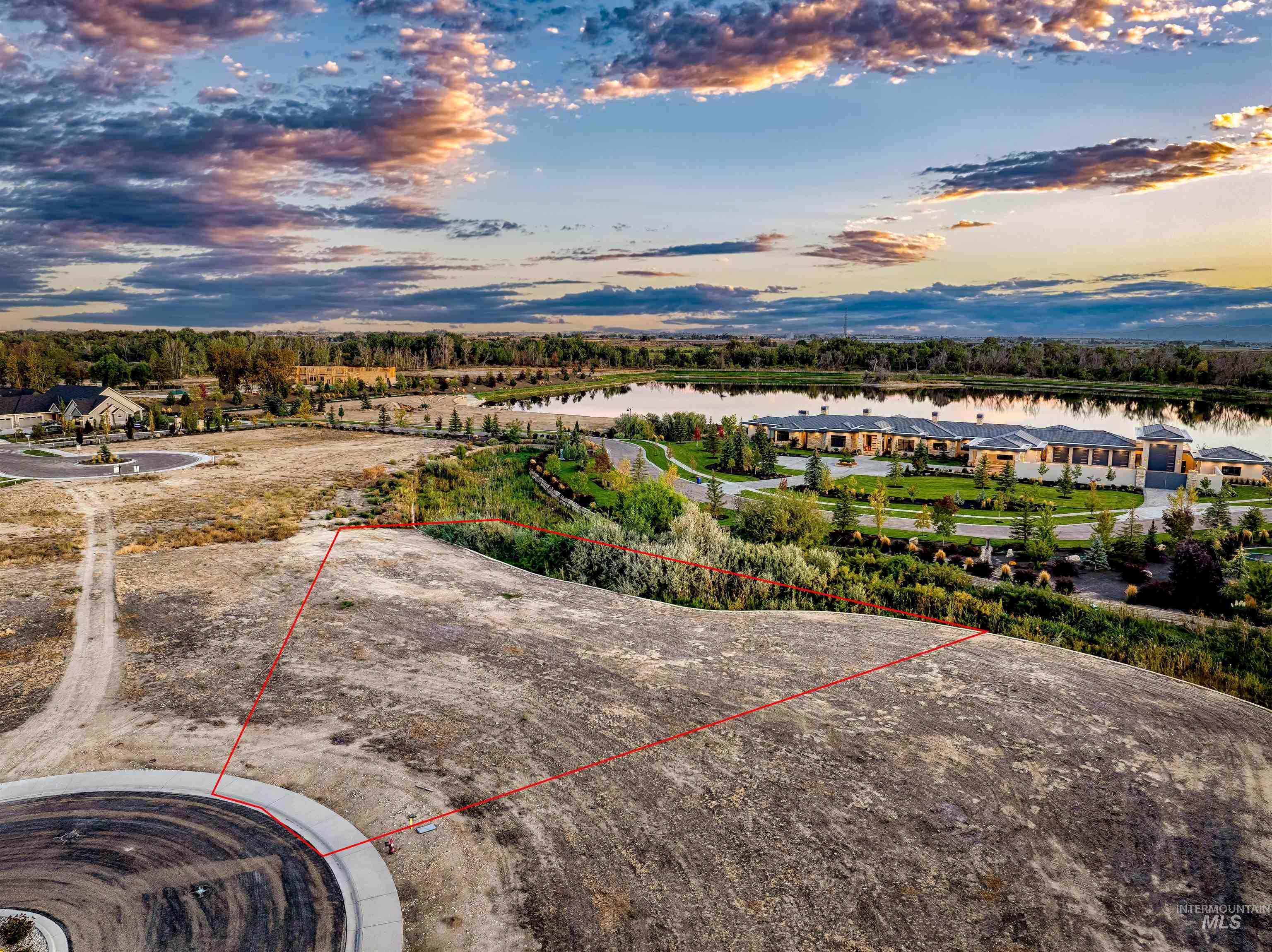View of property location featuring property parcel outlined and a nearby body of water