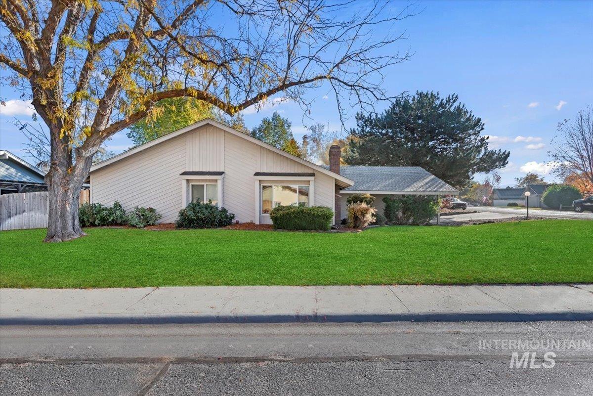 View of front of home with a chimney