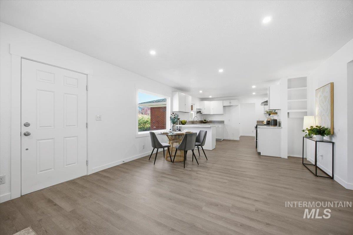 Dining room featuring recessed lighting and light wood-style floors