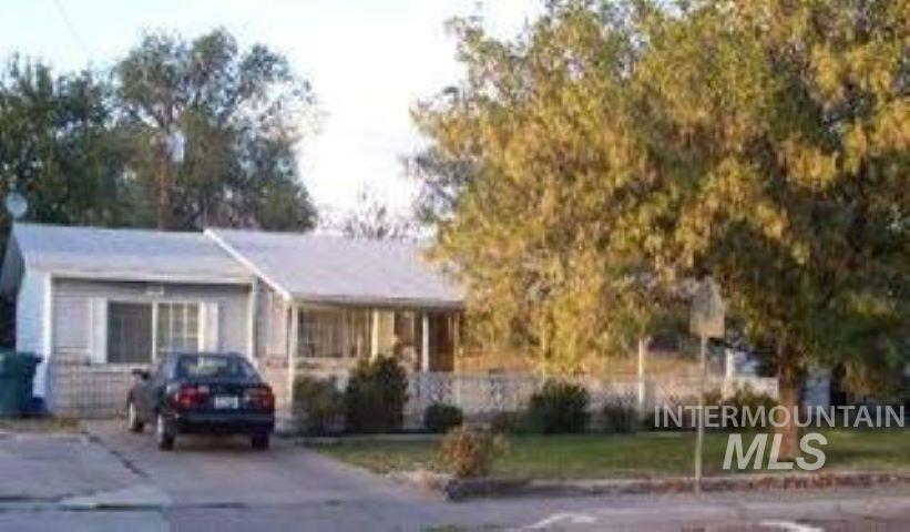 View of front of house with covered porch