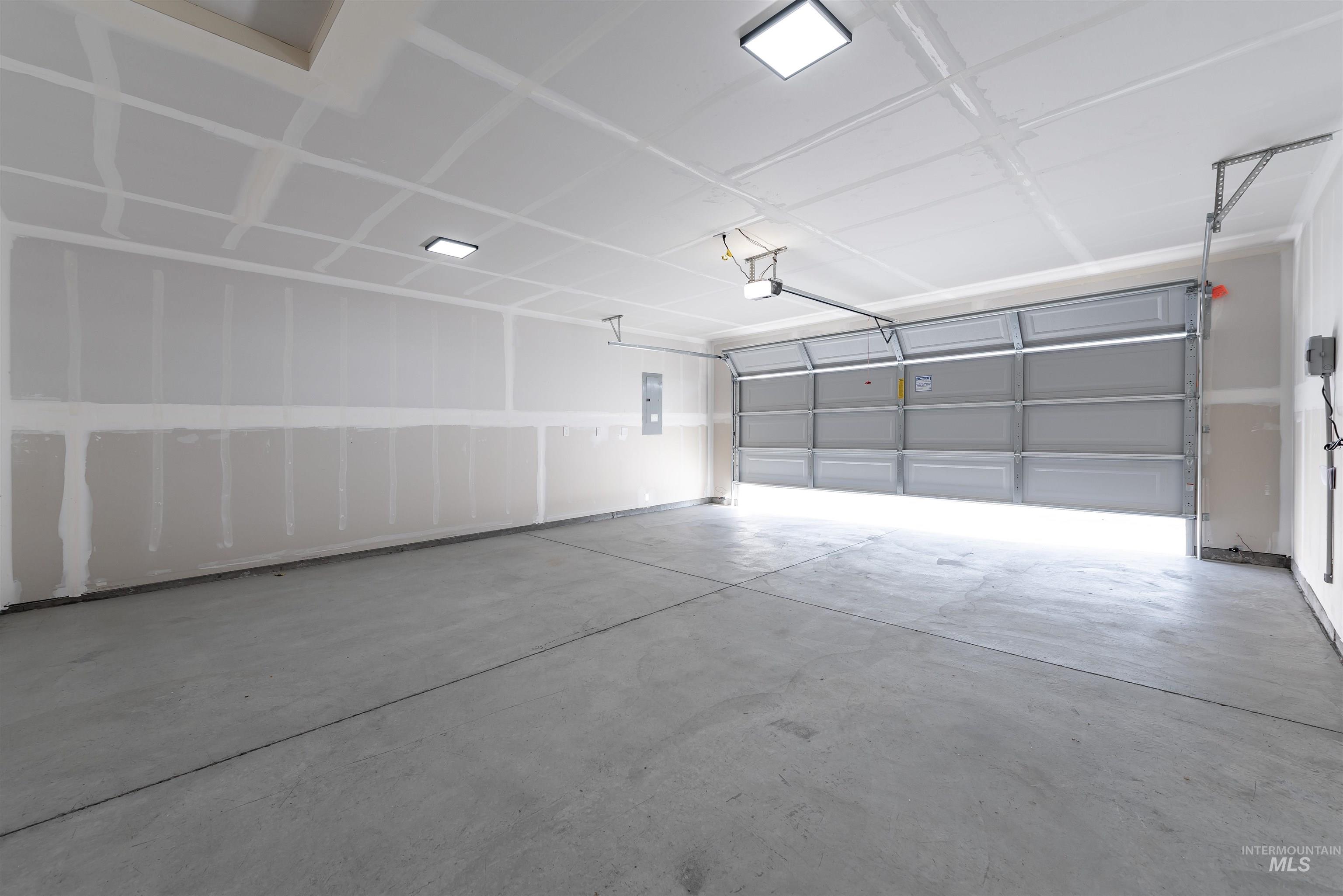 Garage featuring electric panel