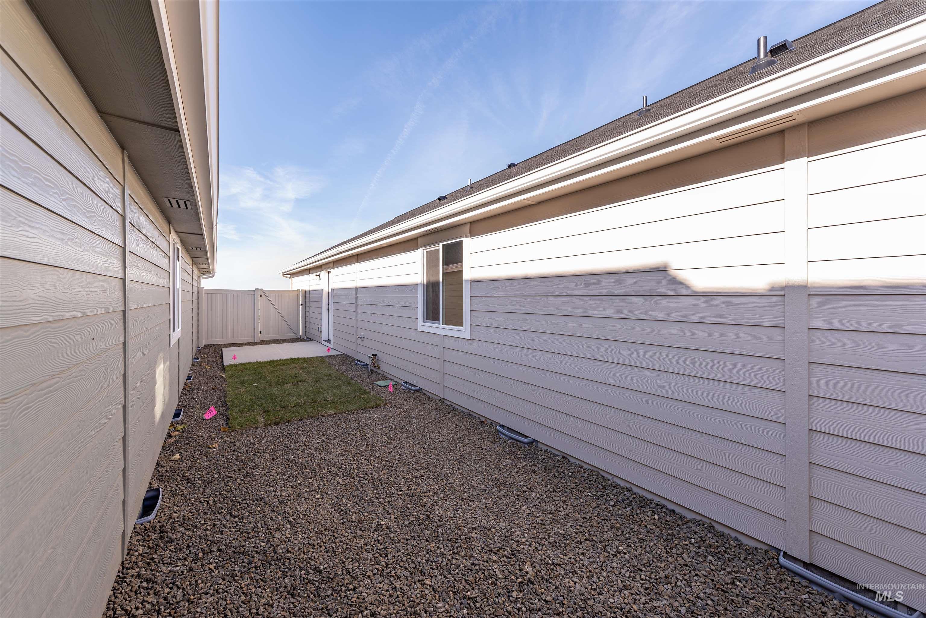 View of fenced backyard
