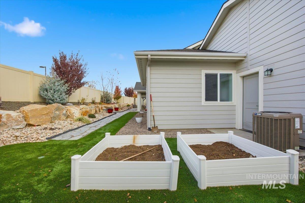 View of yard featuring a vegetable garden