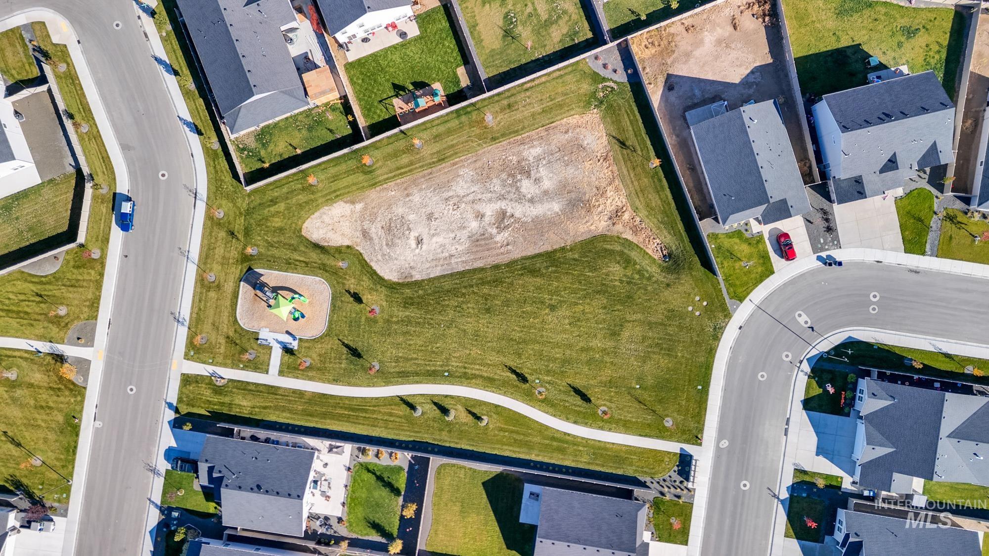 View of property location with nearby suburban area