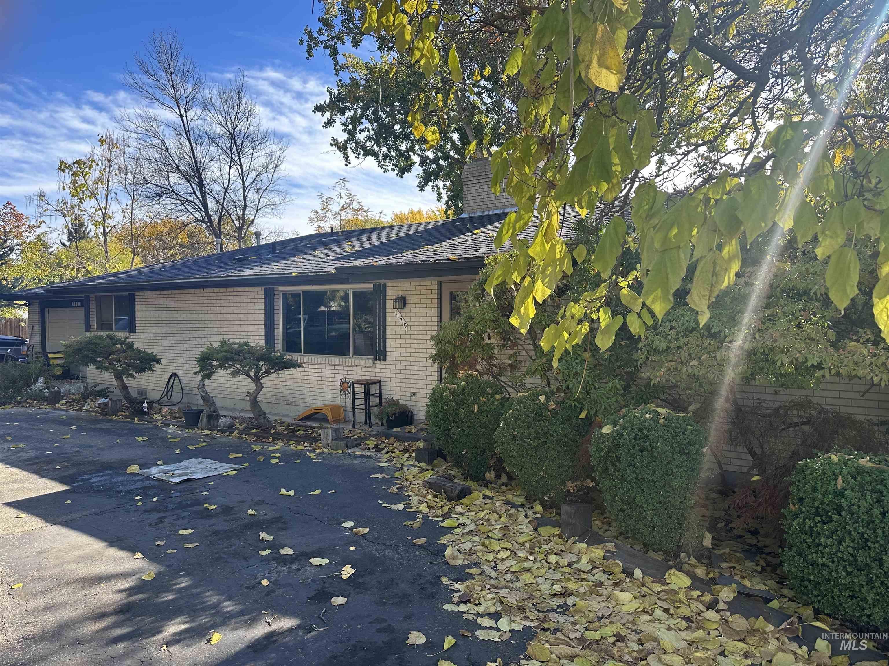View of property exterior featuring brick siding