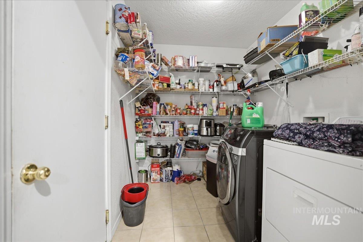 Storage area with washing machine and dryer