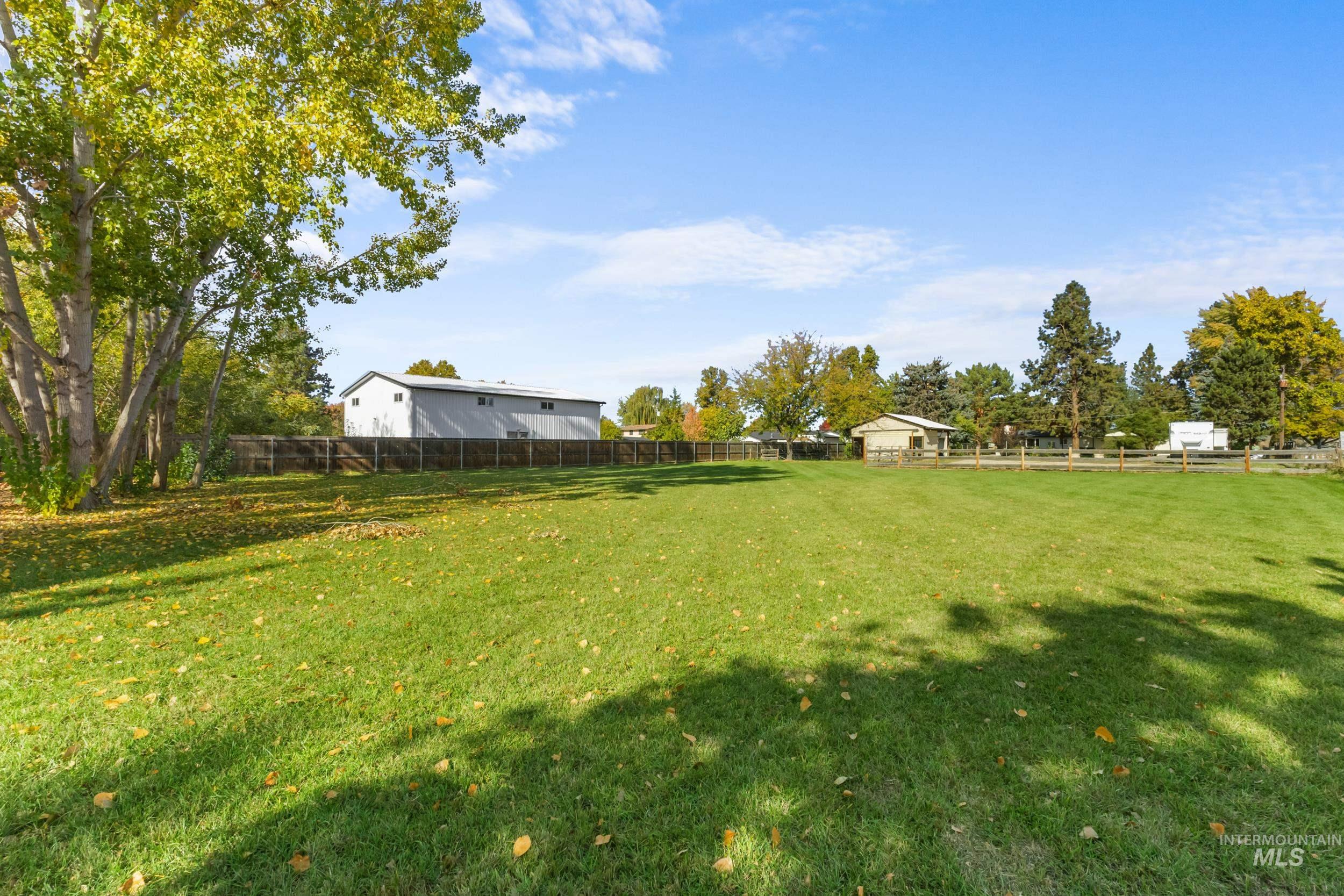 View of fenced backyard