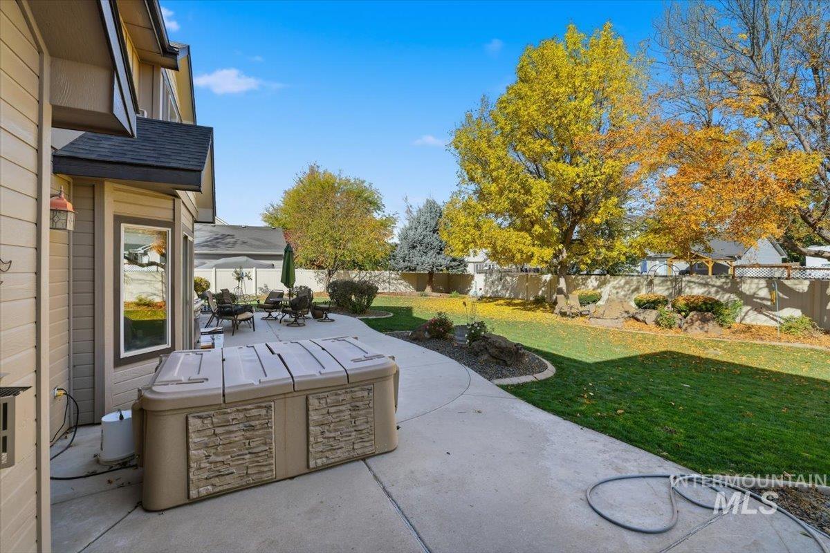 Fenced backyard featuring a patio area