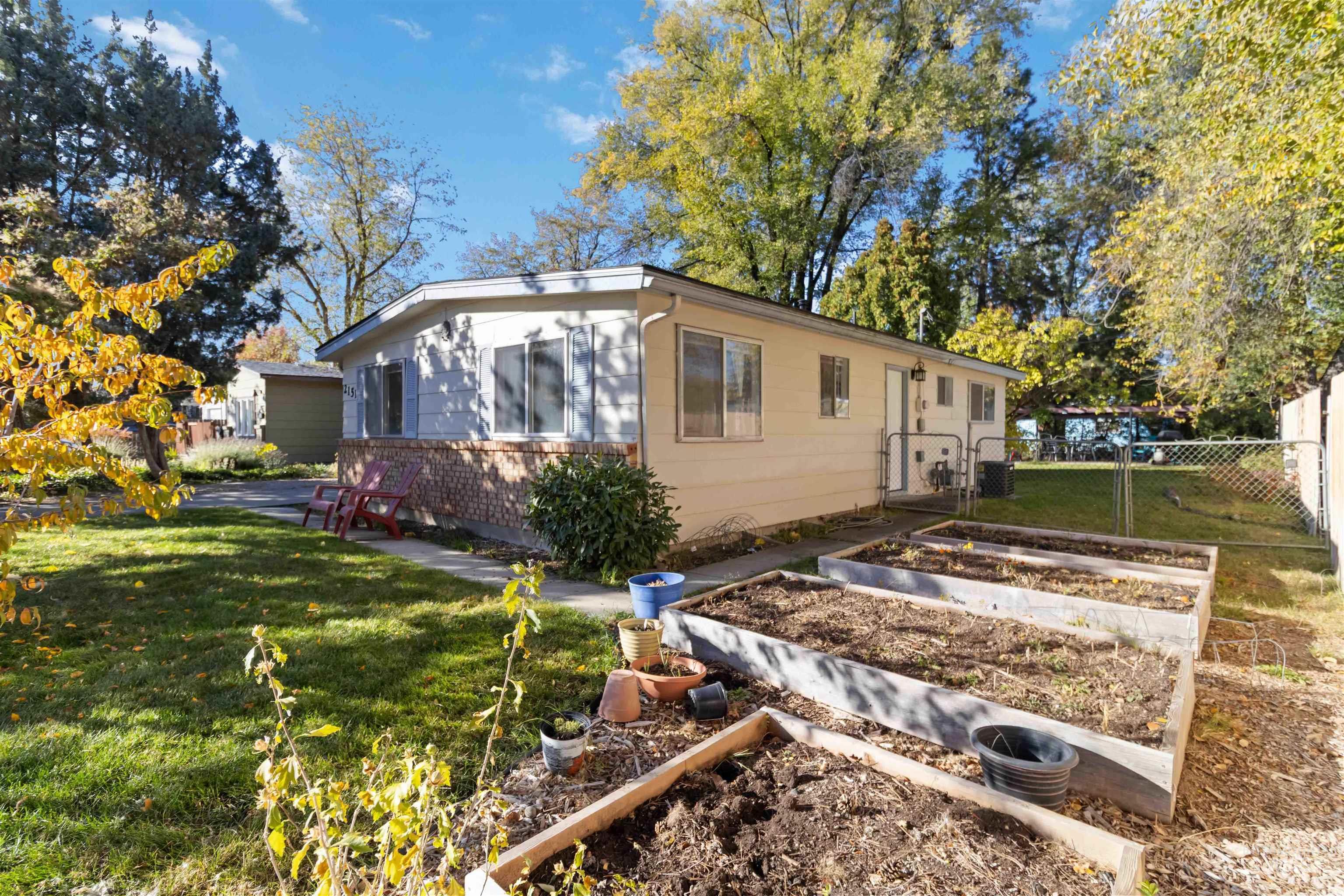 View of property exterior with a vegetable garden