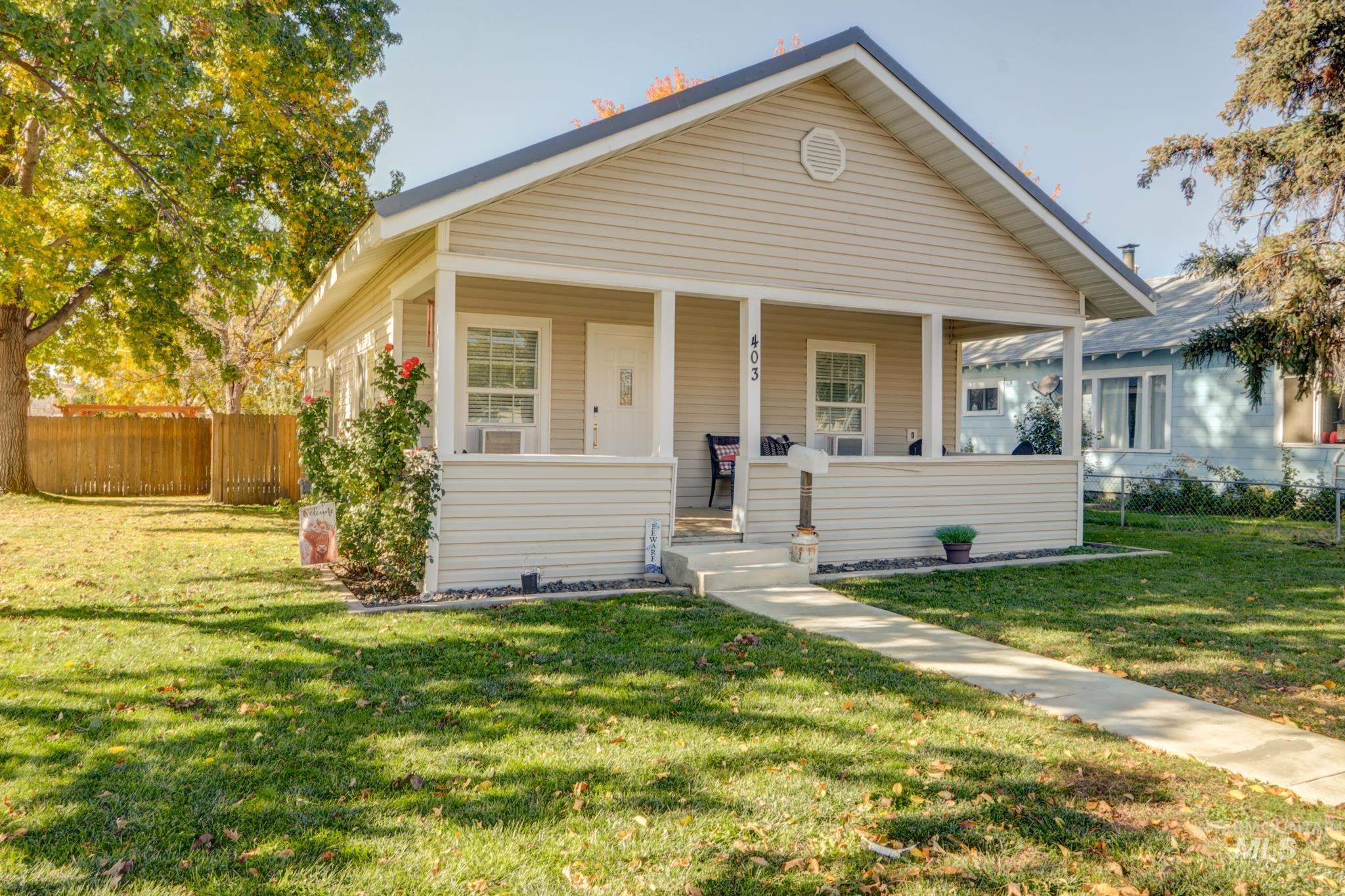 Bungalow featuring covered porch