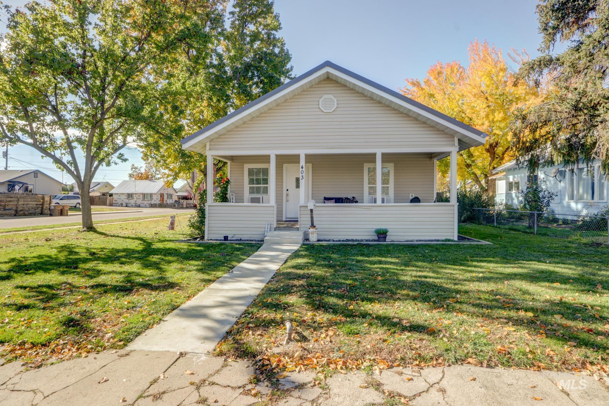 Bungalow-style home featuring covered porch
