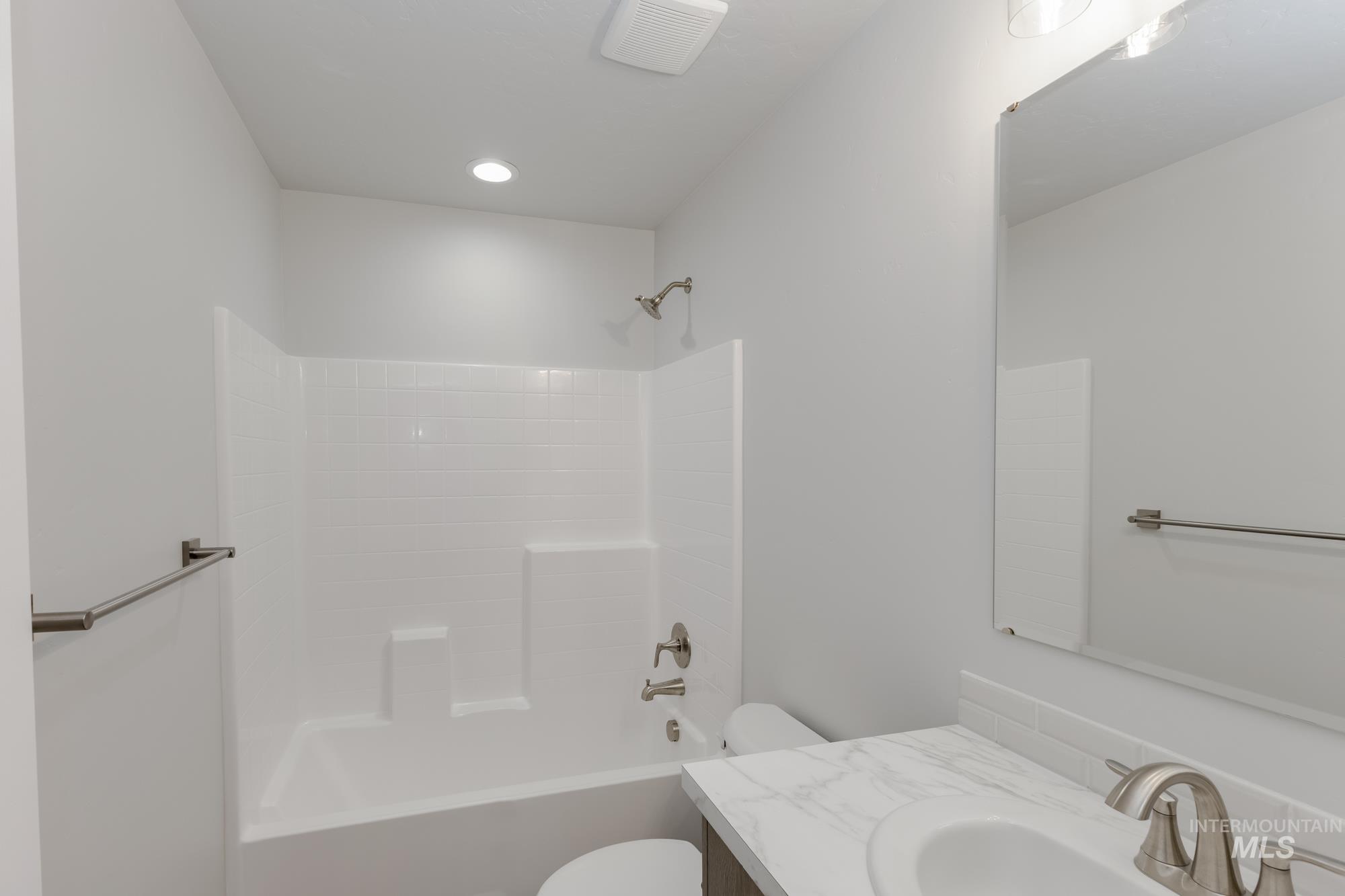 Full bath with bathtub / shower combination and vanity