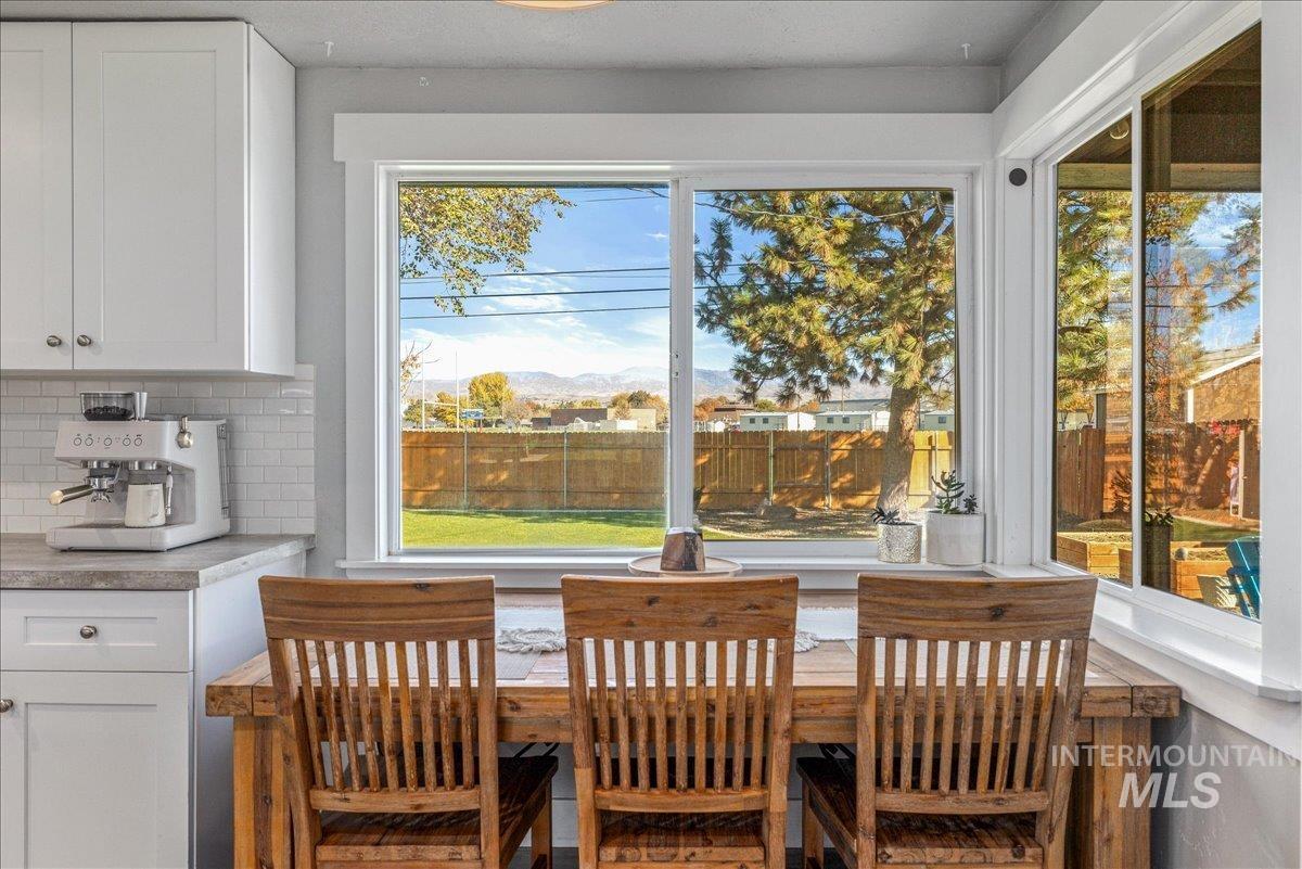 Dining room featuring a mountain view