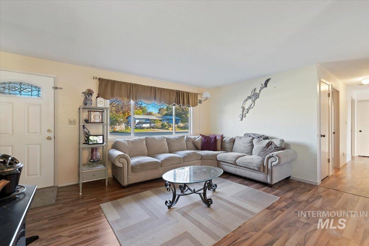 Living room featuring wood finished floors