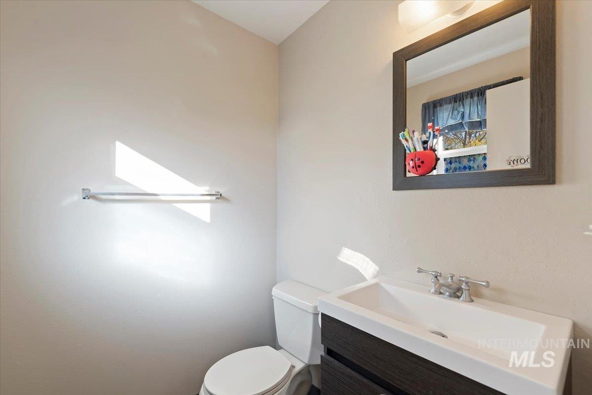 Bathroom with vanity and toilet