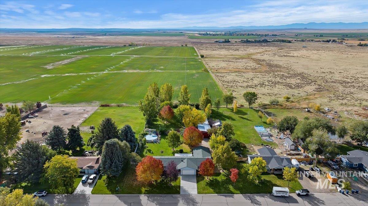 Aerial view of sparsely populated area with mountains