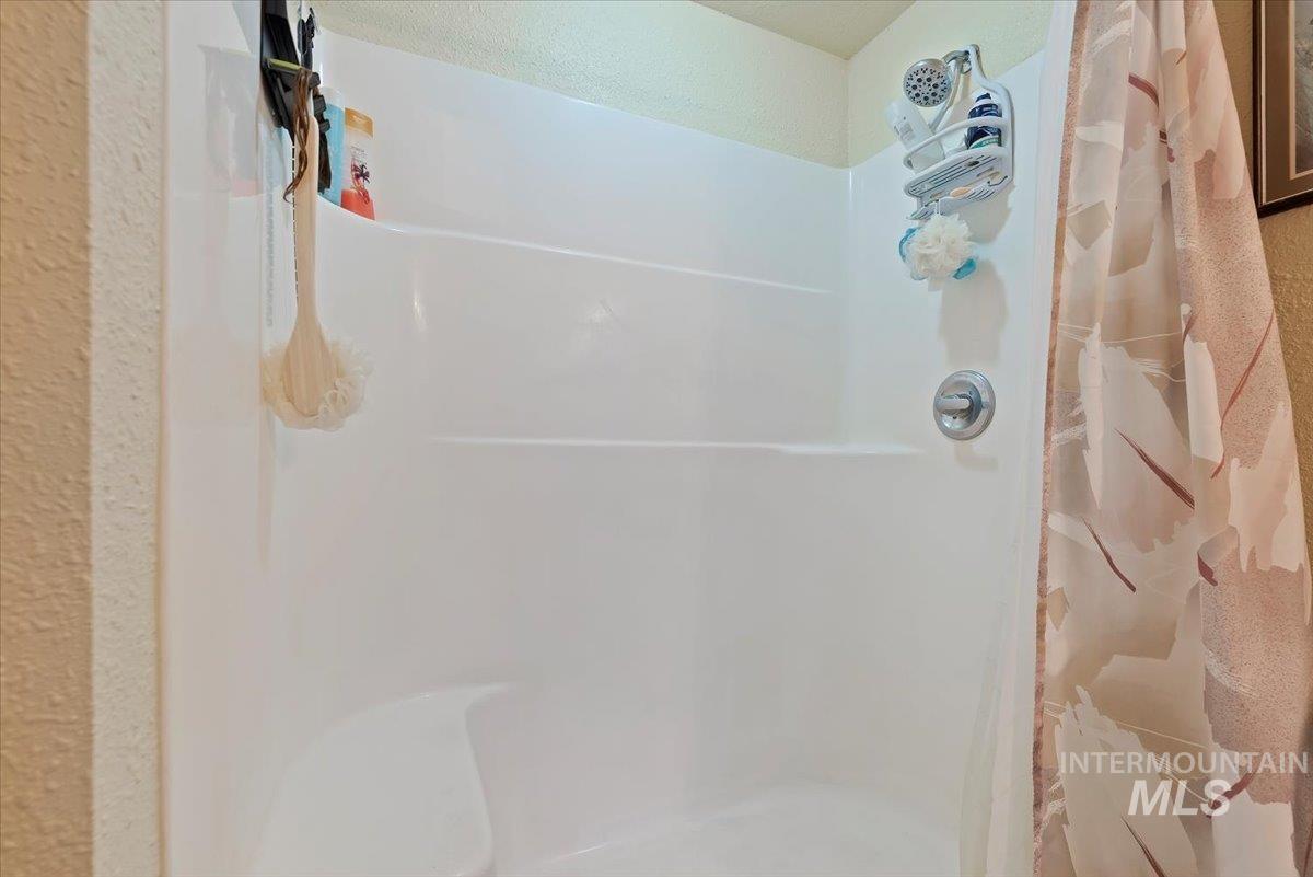 Bathroom with a shower stall