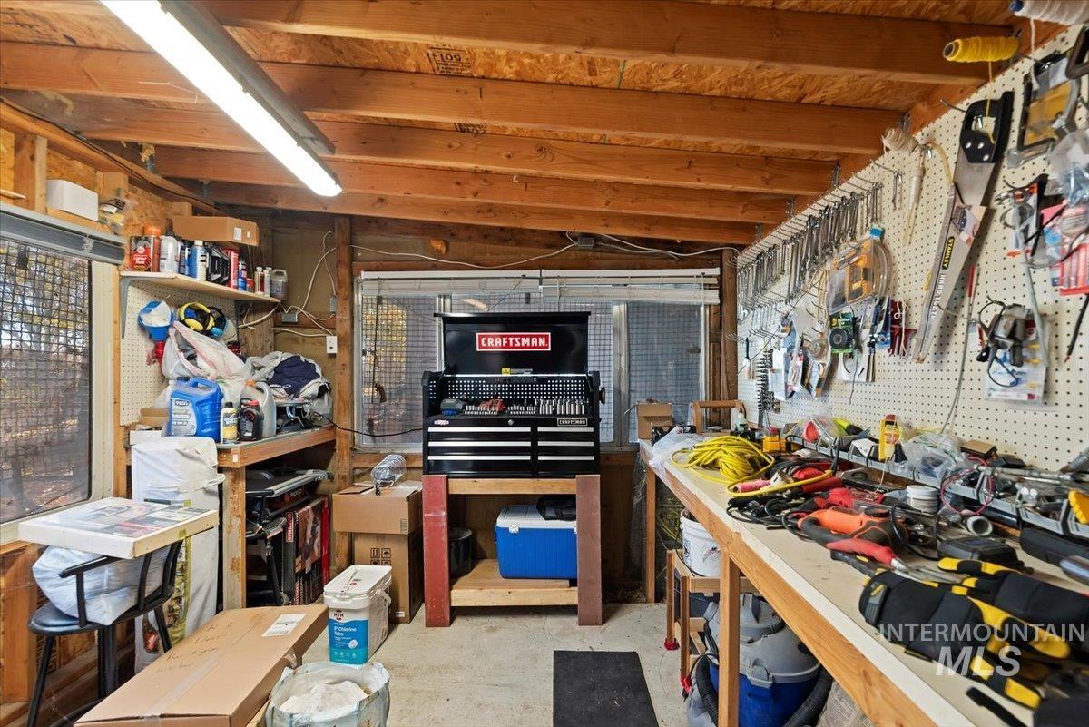 Misc room featuring a workshop area