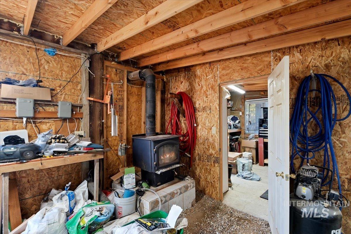 Misc room with a wood stove