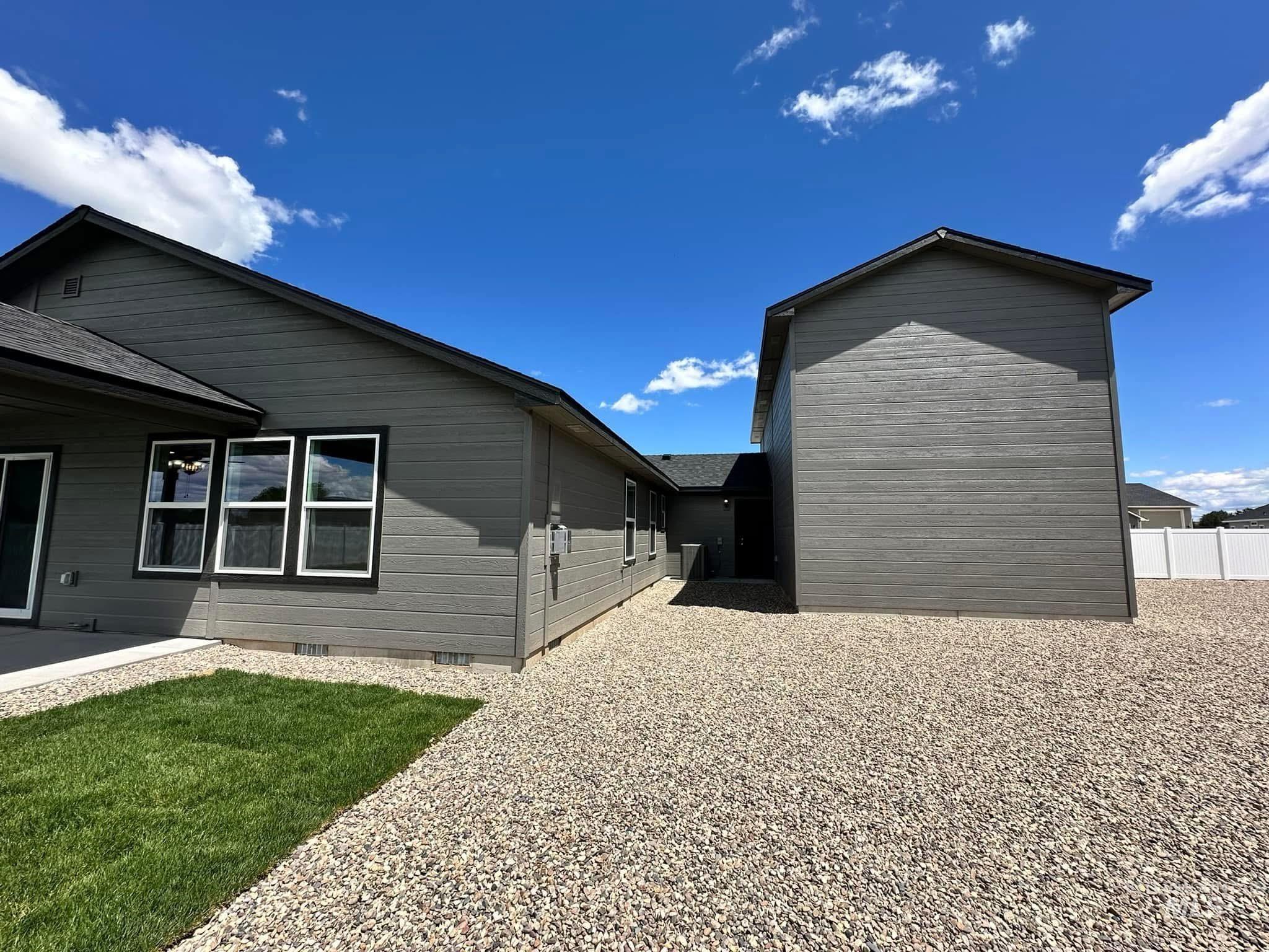 View of property exterior featuring crawl space and a patio area