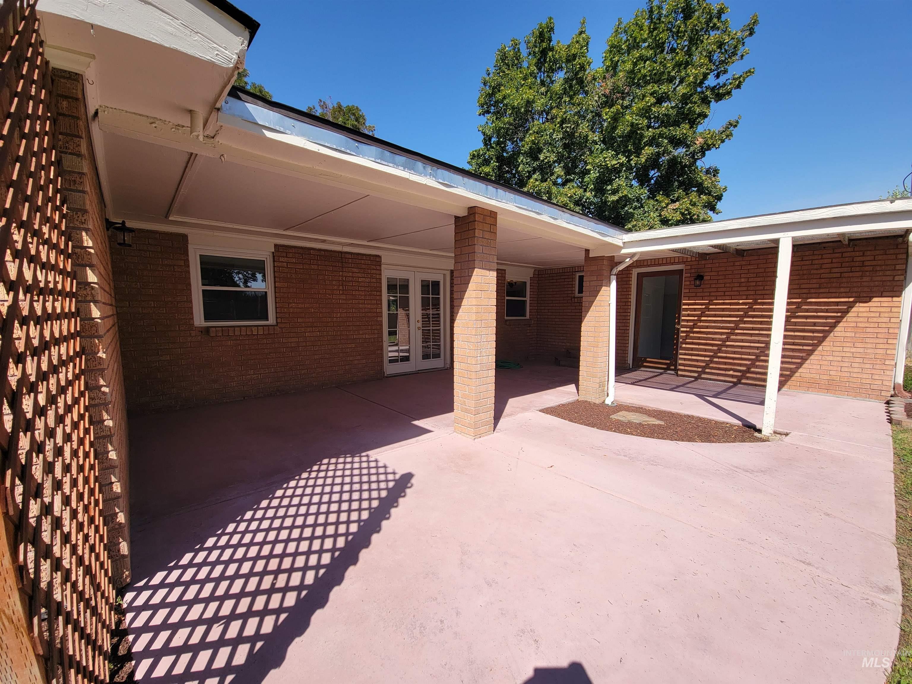 View of patio featuring french doors