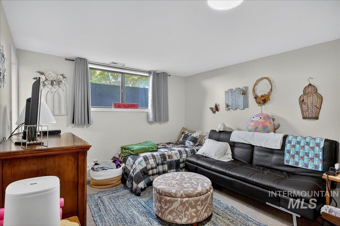 Living area featuring carpet flooring