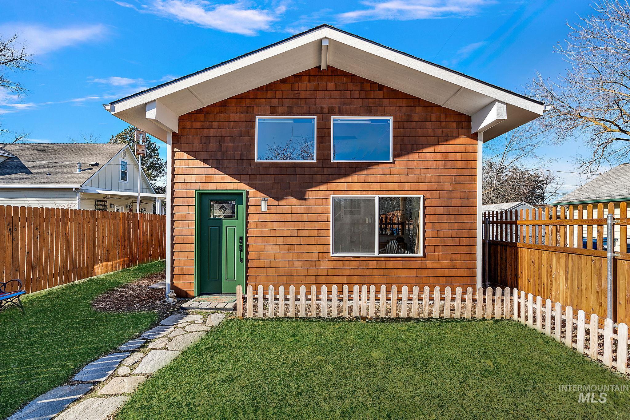 View of front facade featuring a fenced backyard