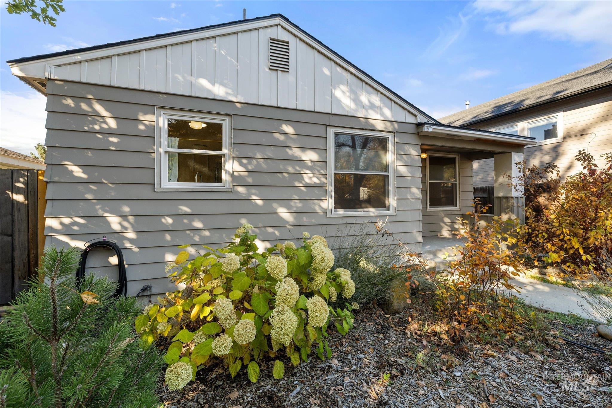View of side of property featuring board and batten siding