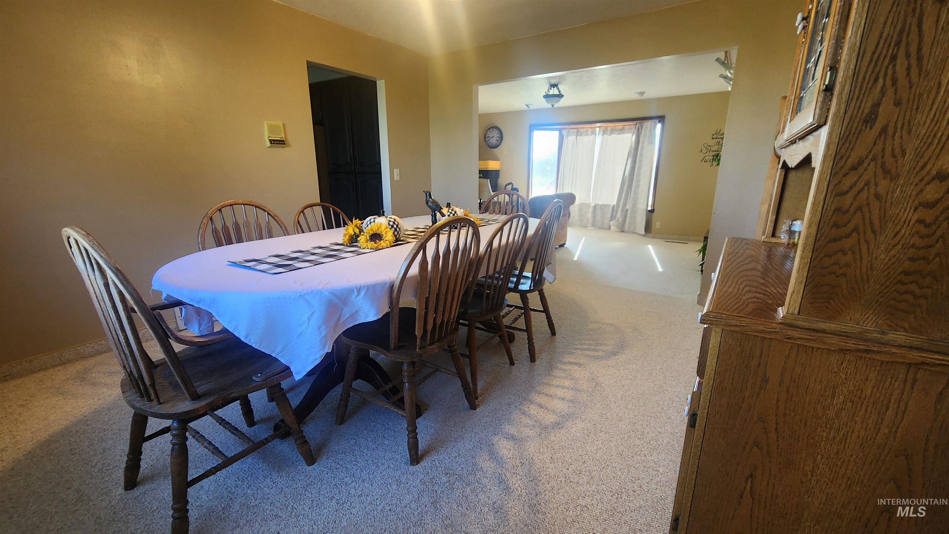View of carpeted dining area