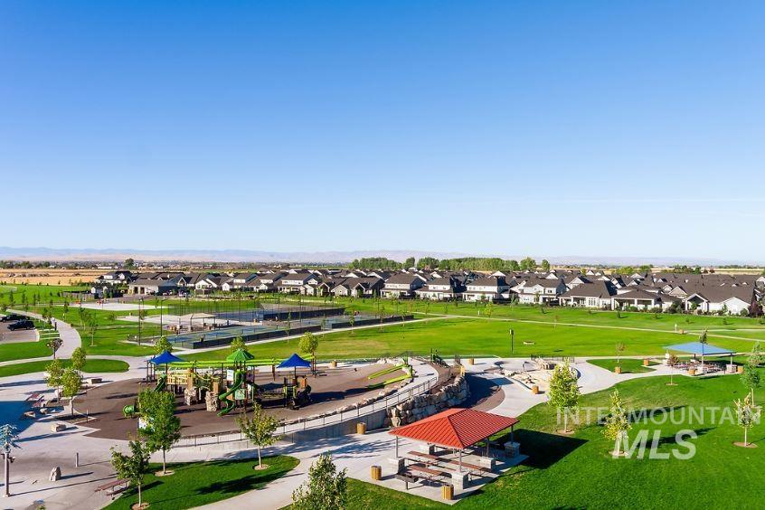 Aerial perspective of suburban area featuring a recreational park