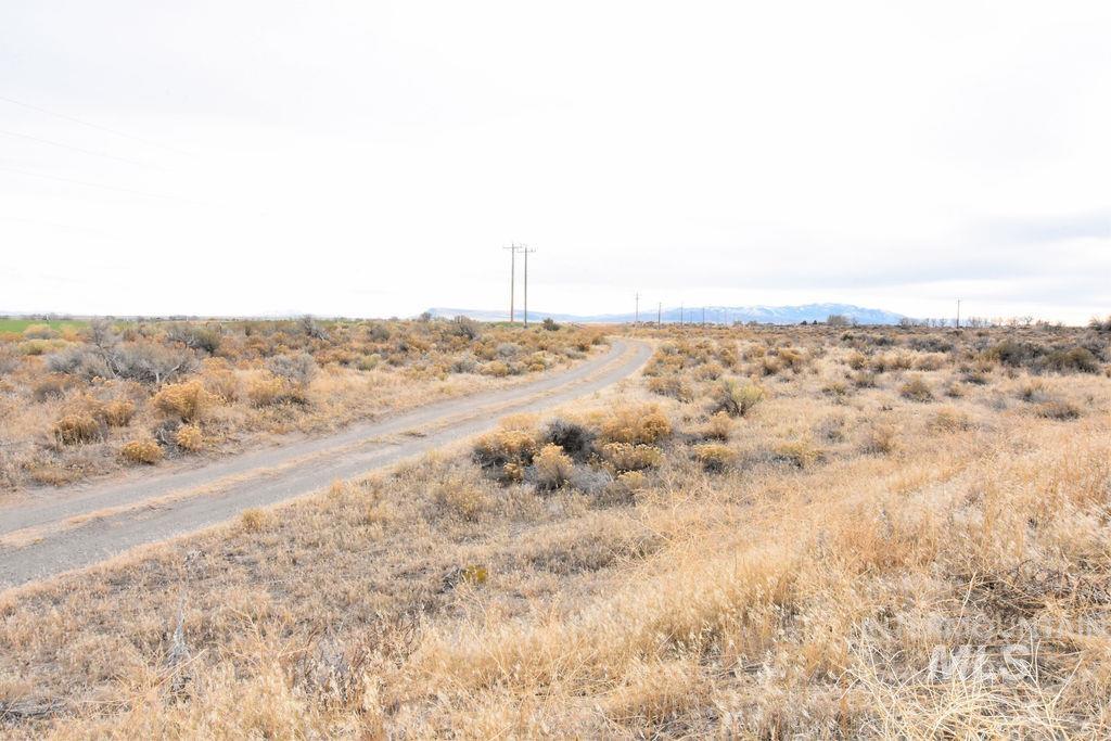 View of street featuring a rural view and a mountain view